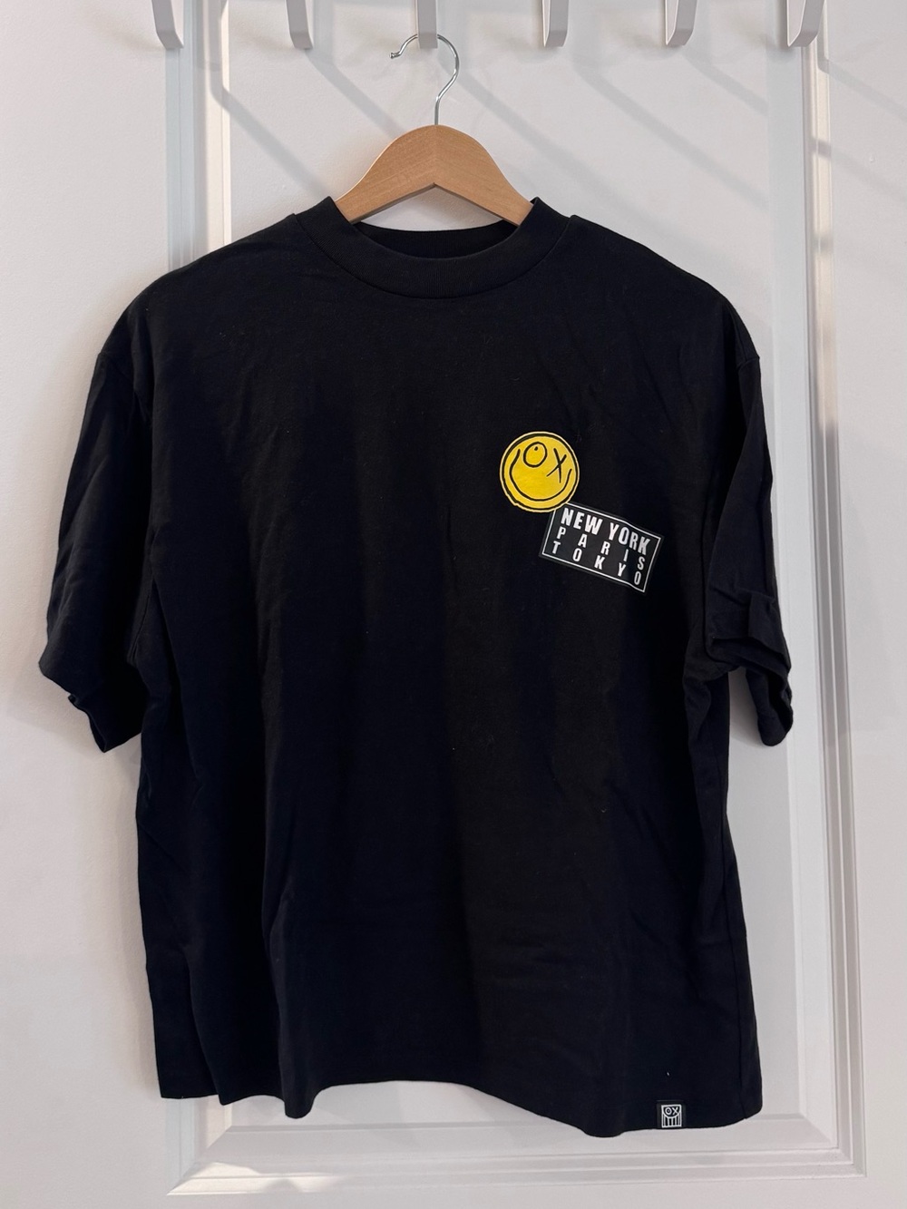 Uniqlo Black Graphic Tee with Yellow Smiley Patch - Andre Saraiva Streetwear